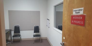 link to full image of County Jail interview room with mirror
