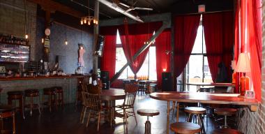 link to full image of Siren Song Tavern Bar, dining room, stage